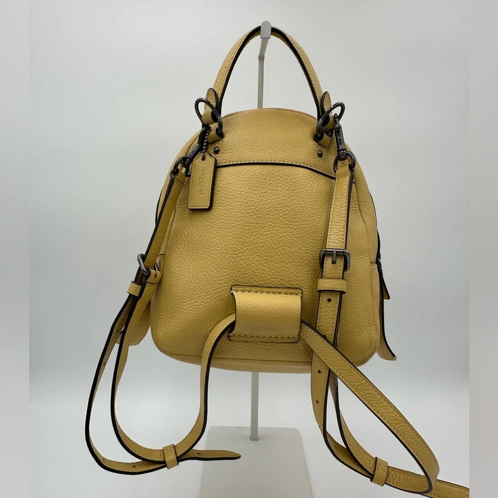 EUC Coach Andi Convertible Backpack with Structured Design. Metallic Hardware.